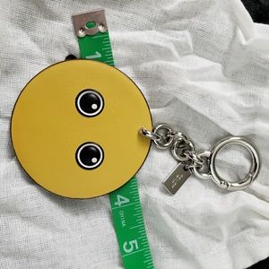 New coach yellow face eyes only keychain
